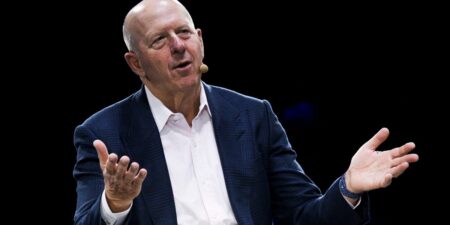 Goldman Sachs chief executive estimates 20 percent probability of recession, cautions on market volatility ahead.